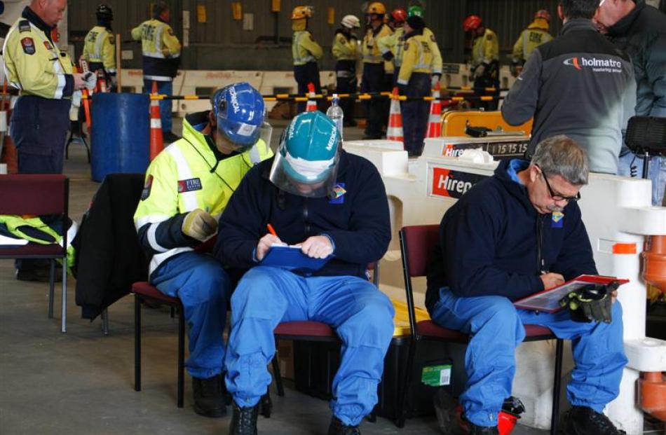 Judges from the United Fire Brigades Association (from left) Jemal Weston, Steve Mann and Tony...