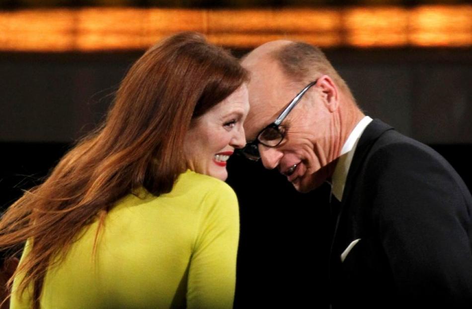 Julianne Moore reacts with co-star Ed Harris after winning the award for outstanding lead actress...