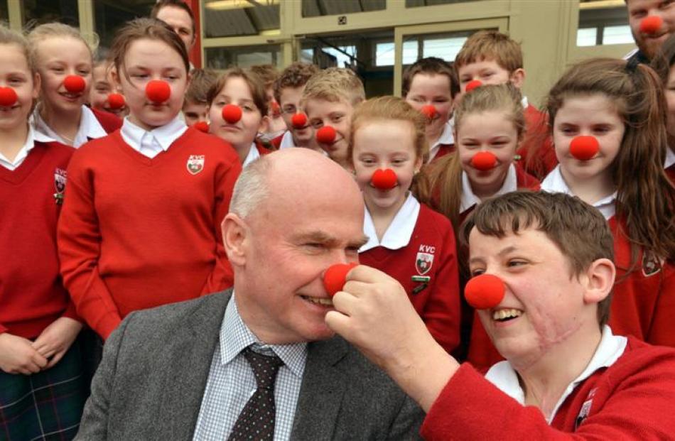 Kaikorai Valley College pupil Brayden Warnock-Hannon (right) celebrates Red Nose Day with deputy...