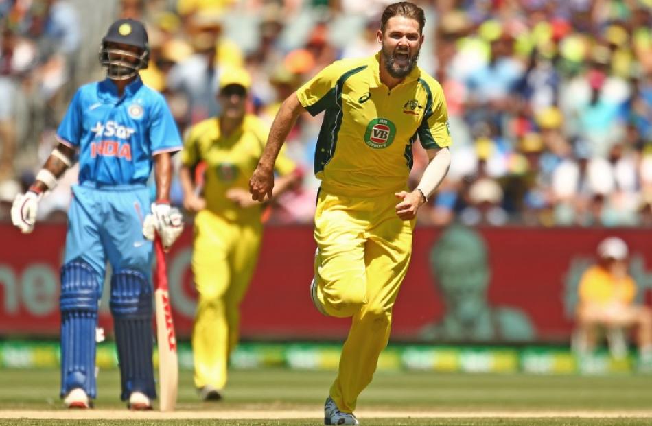 Kane Richardson celebrates a wicket during Australia's recent series against India. Photo: Getty...