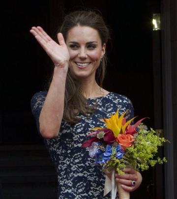 Kate, Duchess of Cambridge waves to the crowd at a ceremony at Rideau Hall in Ottawa, Ontario.  ...