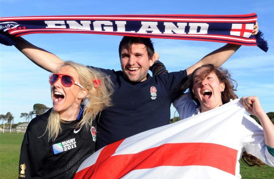 Katie Flatters, Richard Jennings and Lara Flatters, of Staffordshire, show their support for...