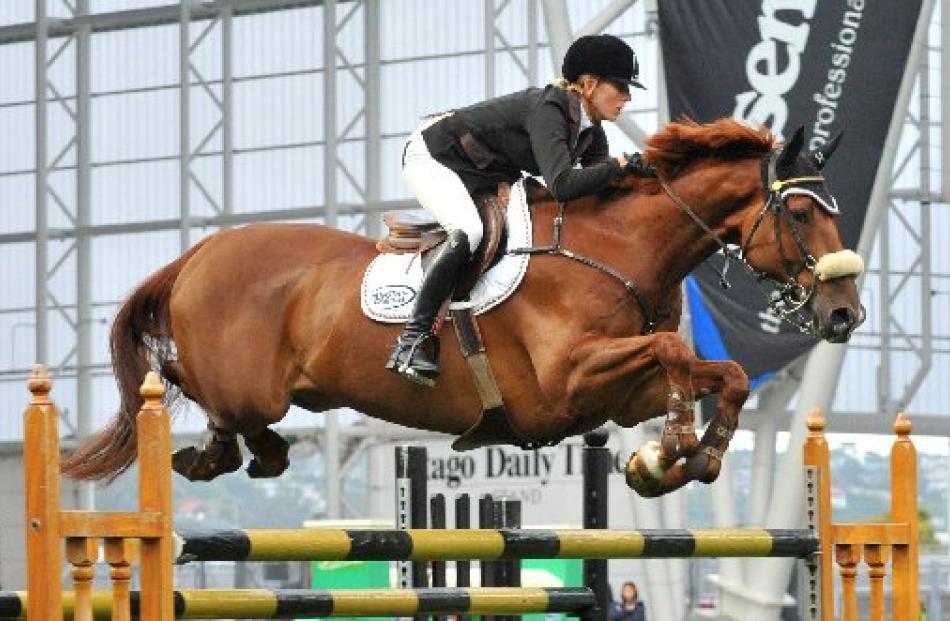 Katie McVean, on Dunstan Kiwi Iron Mark, wins the Super Grand Prix show jumping at Ride the...