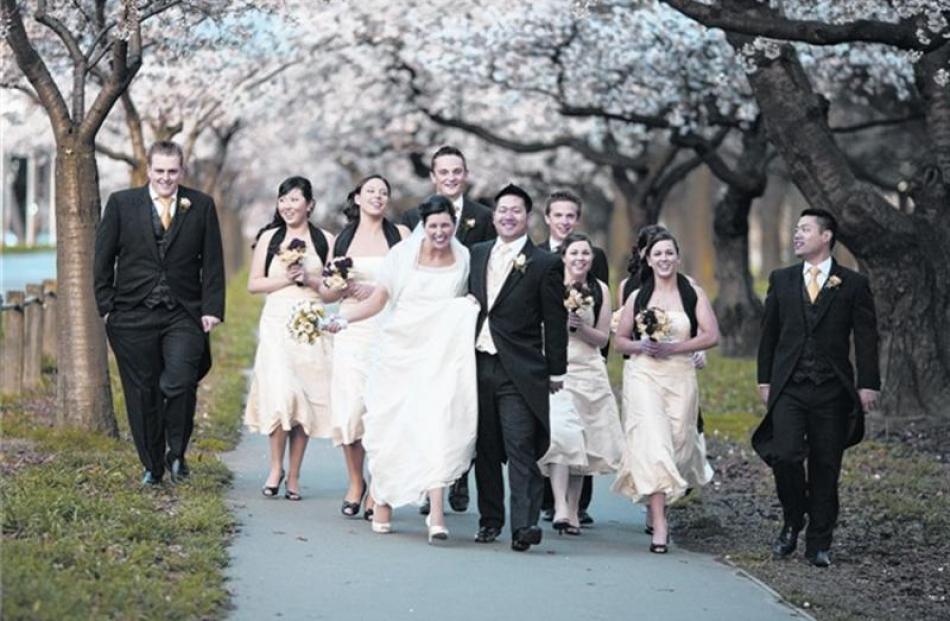 Keagan Ho and Michelle Soakell with their wedding party after their marriage in Christchurch last...