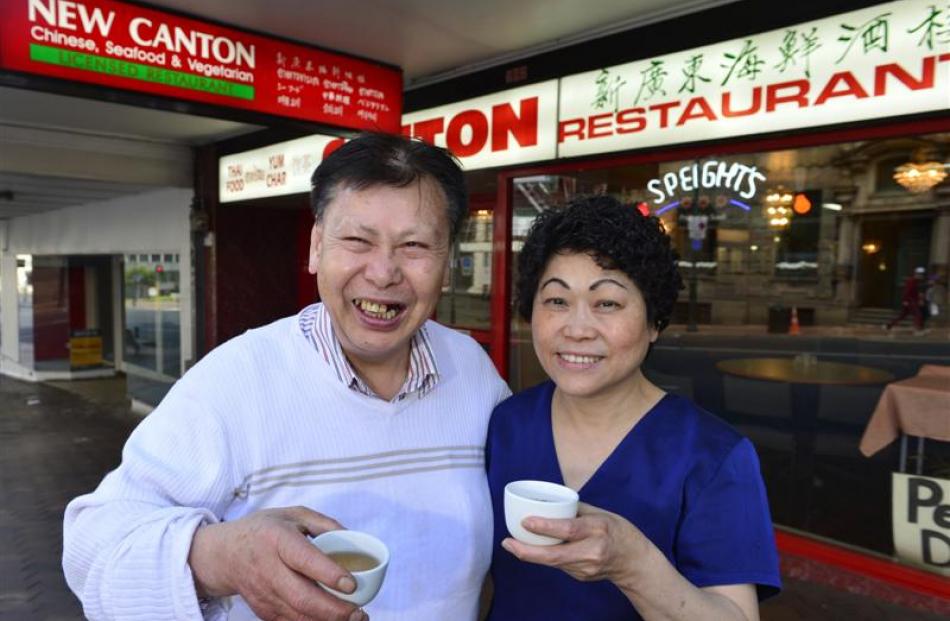 Kee and Sanny Young toast the end of an era at the New Canton Restaurant yesterday. Photo by...
