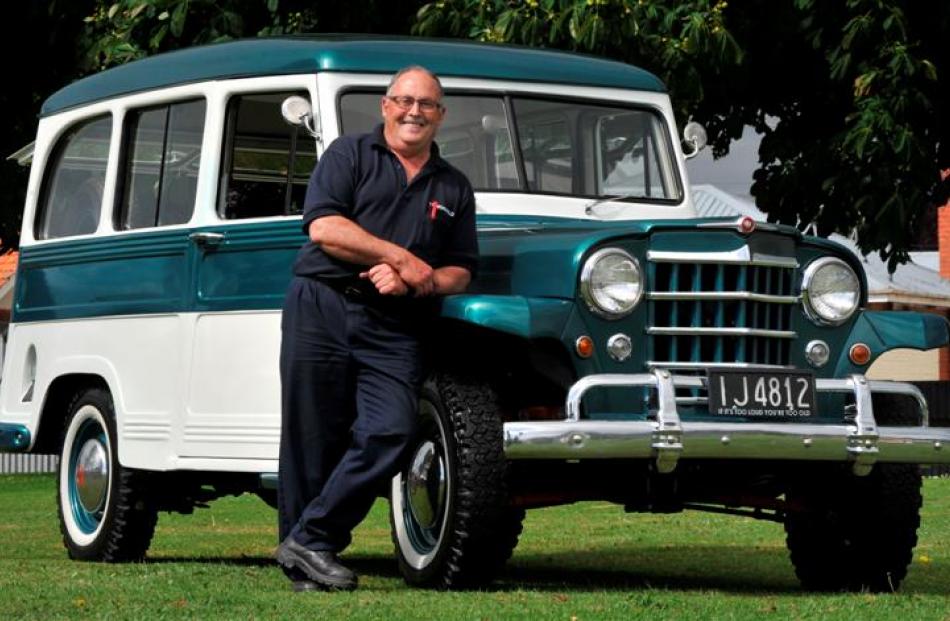 Ken Rapley with his restored 1952 Willys Jeep station wagon in Mosgiel yesterday. Photos by Craig...