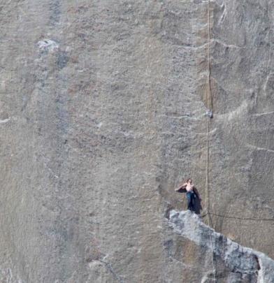 Kevin Jorgeson looks up from Pitch 18 on the Dawn Wall of the El Capitan rock formation in...