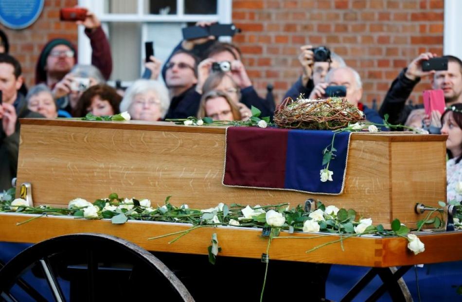 King Richard III's coffin arrives outside Leicester Cathedral in Leicester, central England...