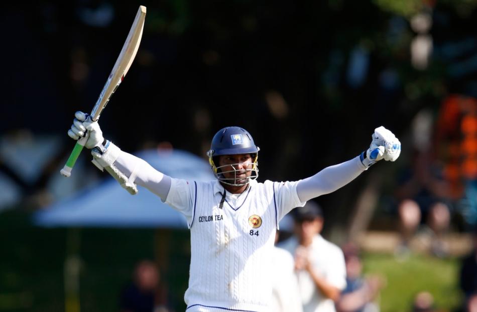 Kumar Sangakkara of Sri Lanka celebrates his 200 runs during day two of the Second Test match...