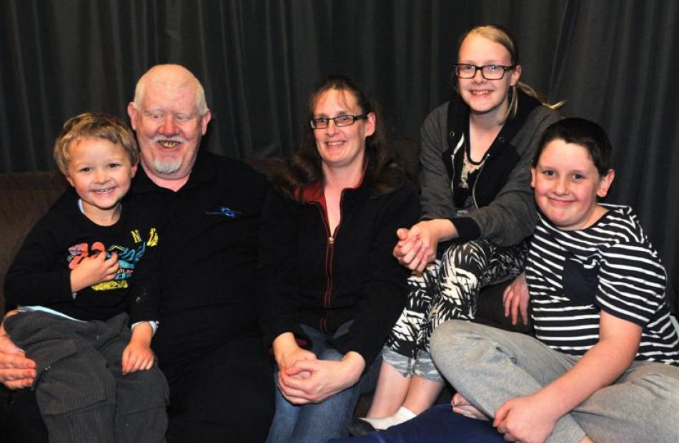 Lance Patterson with his family (from left) son Jaydon Patterson (3) wife Helen Patterson,...