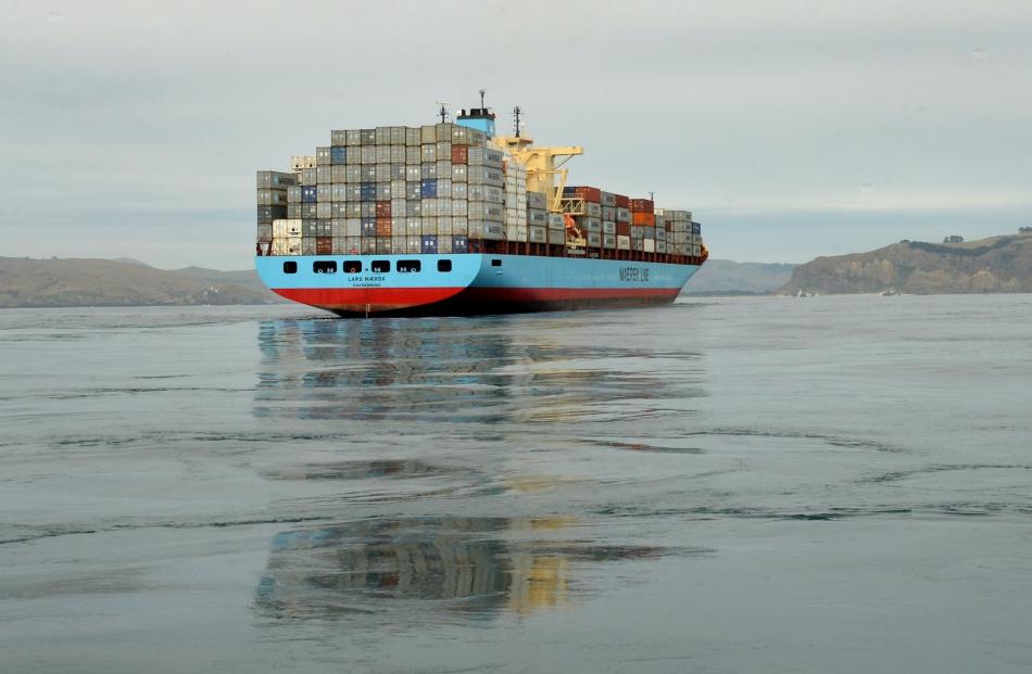 The Lars Maersk makes its way along the harbour channel towards Port Chalmers. PHOTO: STEPHEN...