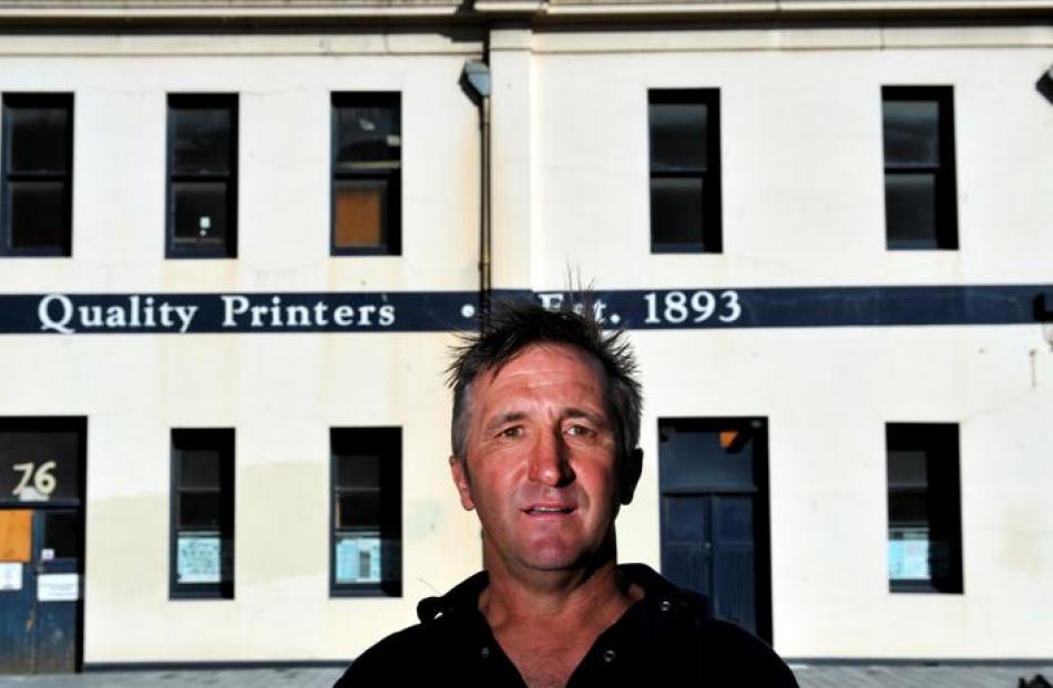 Lawrie Forbes outside the former McIndoe Print building in Vogel St, which he wants to transform...