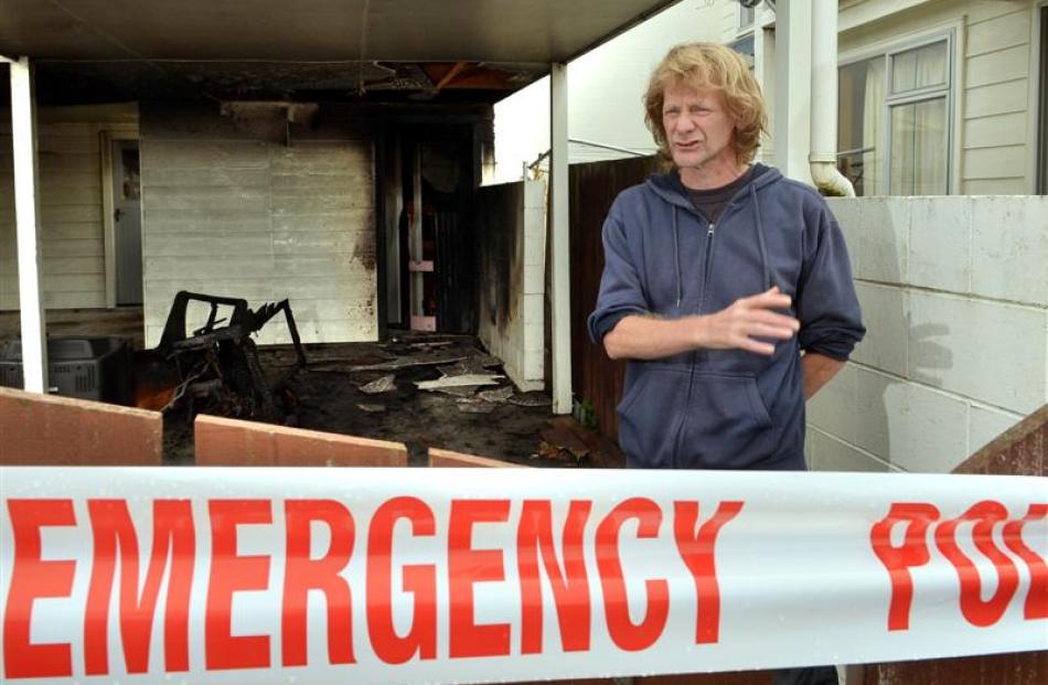 Leith St resident Nick Maydon was woken up by passers-by telling him the carport at his Housing...