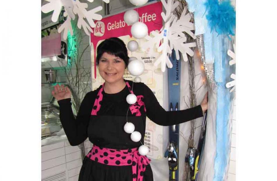 Lick Dessert Bar owner Tracy Stratford welcomes customers to an ice cave made from polystyrene,...
