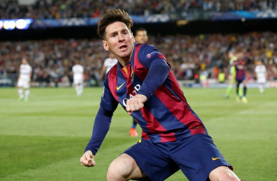 Lionel Messi celebrates a goal for Barcelona.