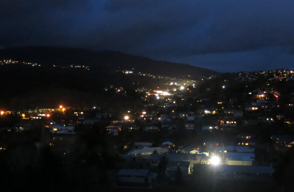 Looking across a dark Kaikorai Valley in Dunedin at 7pm. Photo by Craig Baxter