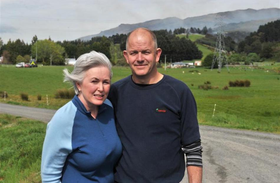 Lynn and Paul Bennett,  who had to flee from their home after flames came close to claiming the...