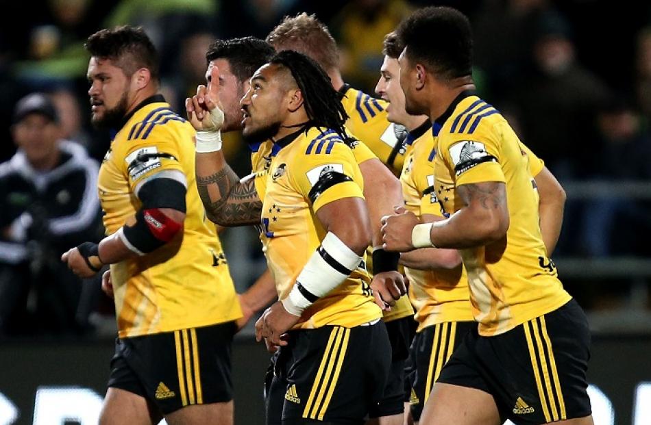 Ma'a Nonu gestures after scoring a try for the Hurricanes against the Highlanders. Photo Getty