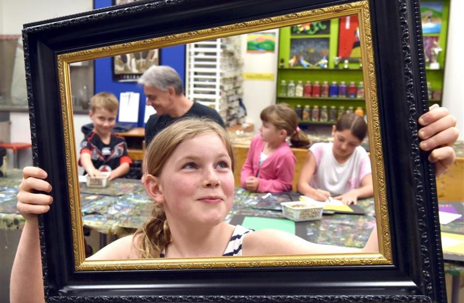 Madeline Henderson (8) admires a painting frame  at the Dunedin Public Art Gallery. Her...