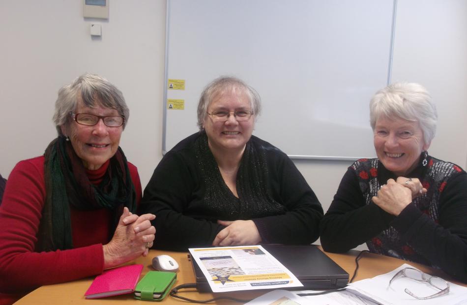 Malvern Community Hub volunteers (from left)  Bev Elder, Kathy Stirrup and Denise Reynolds plan...