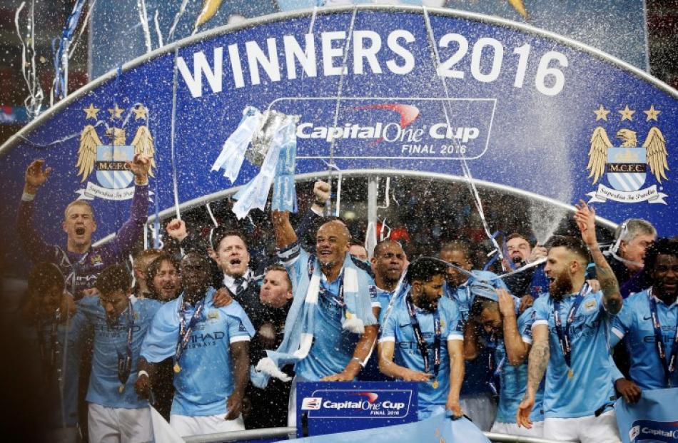 Manchester City players celebrate their victory. Photo Reuters