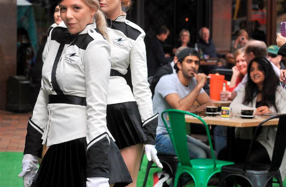 Marching girls Molly McDowall (front) and Georgie Goate, of Auckland, perform part of a burlesque...