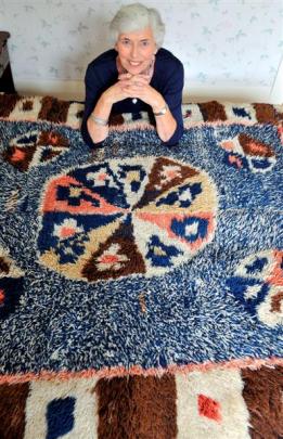 Margaret Woodhead, of Dunedin, with a rug made in the Shetland Islands by her great great...