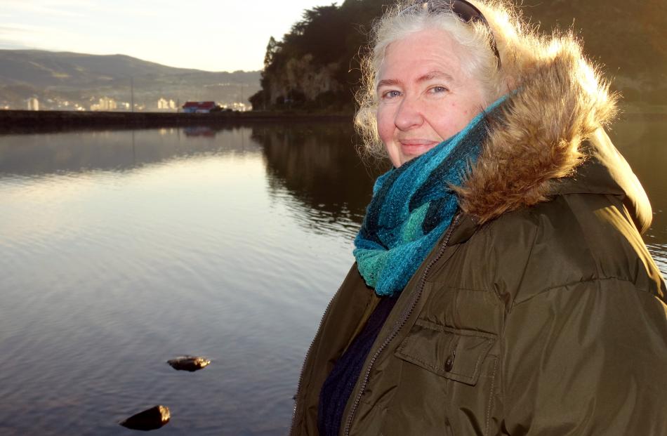 Marine scientist Dr Jean McKinnon checks Andersons Bay Inlet for signs of octopuses. It is common...