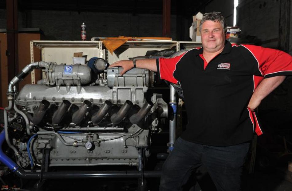 Mark Cameron and his V12 Rolls Royce Meteor engine. Photo by Gregor Richardson.