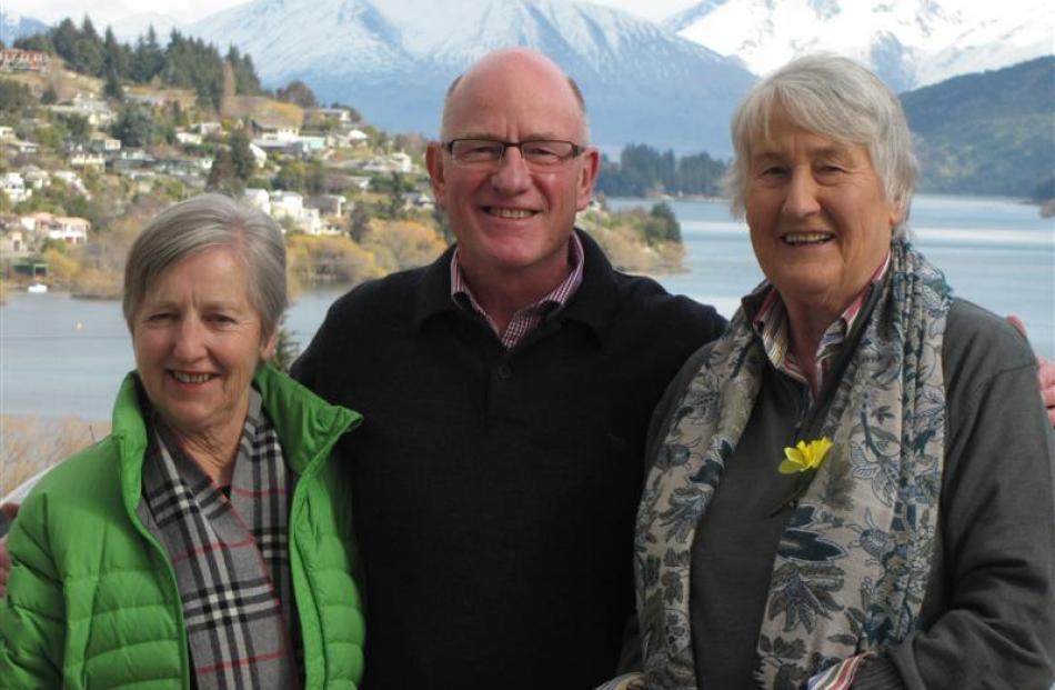 Mary Wayte, left, and Pat Topliss, right, who both received recognition of 15 years' service to...