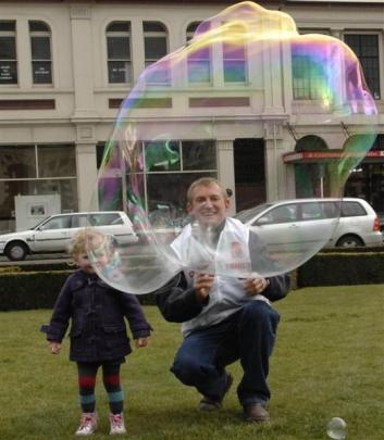 Matt Hutcheson, of Waikouaiti, makes a giant bubble at the Dunedin Railway Station on Saturday...