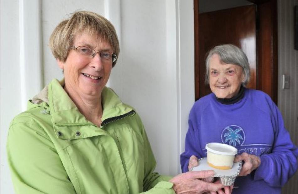 Meals on wheels volunteer Tess Gilfedder delivers a meal to Irene Keogh, of Halfway Bush, Dunedin...