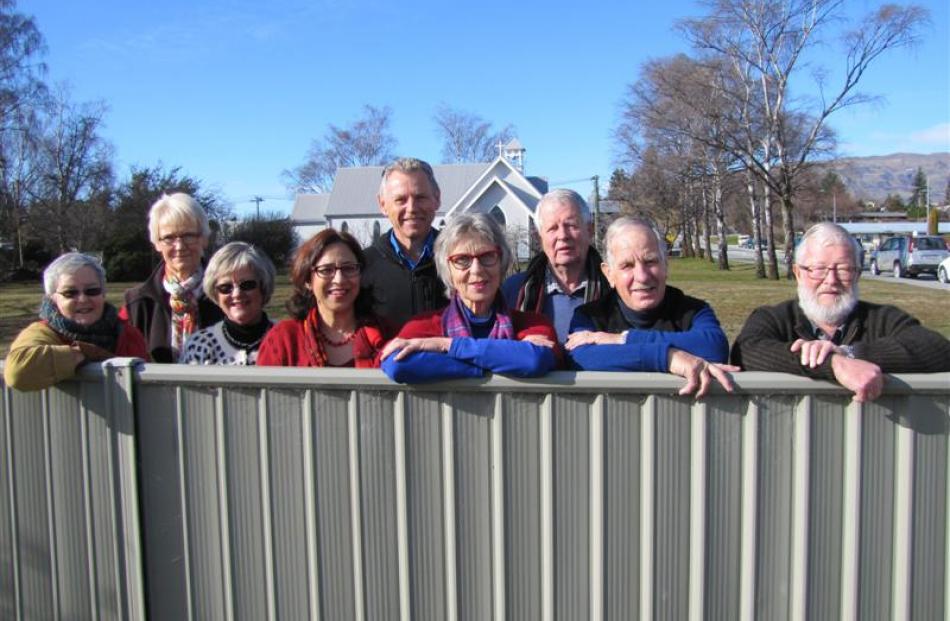 Members and supporters of the Wanaka Community House Charitable Trust on the site of the proposed...