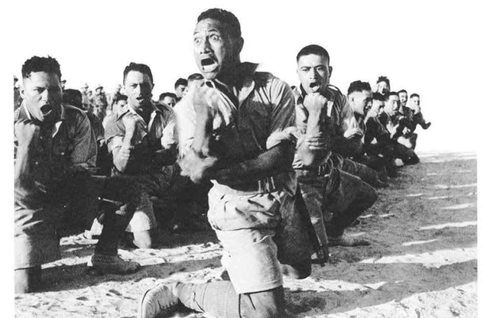 Members of the Maori Battalion perform a haka in the Western Desert in World War 2.