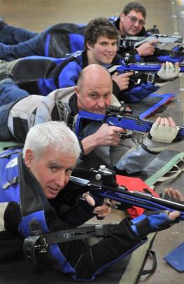 Members of the winning Otago Blue and Golds smallbore shooting team at the rifle range in Dunedin...