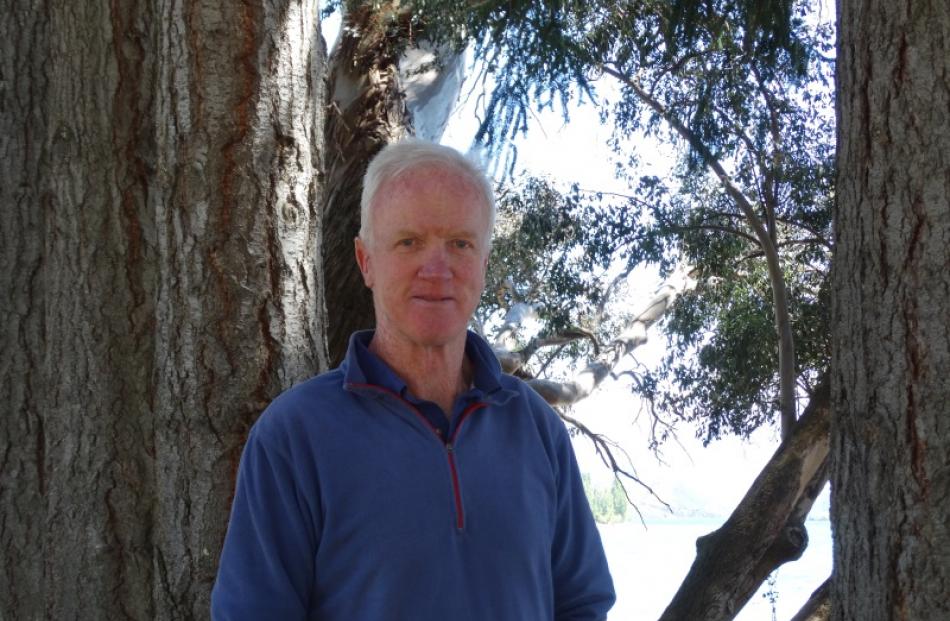 Michael Sidey stands among the trees where the Wanaka Watersports Facility would be built on the...