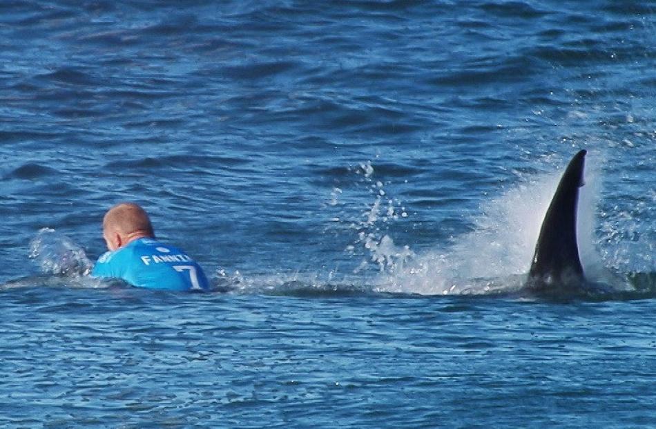 Mick Fanning's first encounter with a shark. Photo Reuters