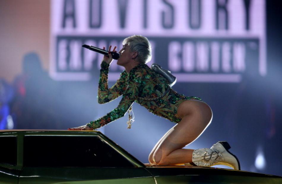 Miley Cyrus has a fan in Kylie Minogue. (Photo by Adam Bettcher/Getty Images)