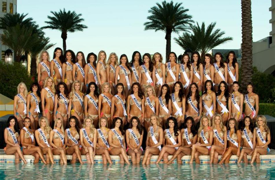 The 51 contestants competing for the title of Miss USA 2010 pose for the official swimsuit photo...