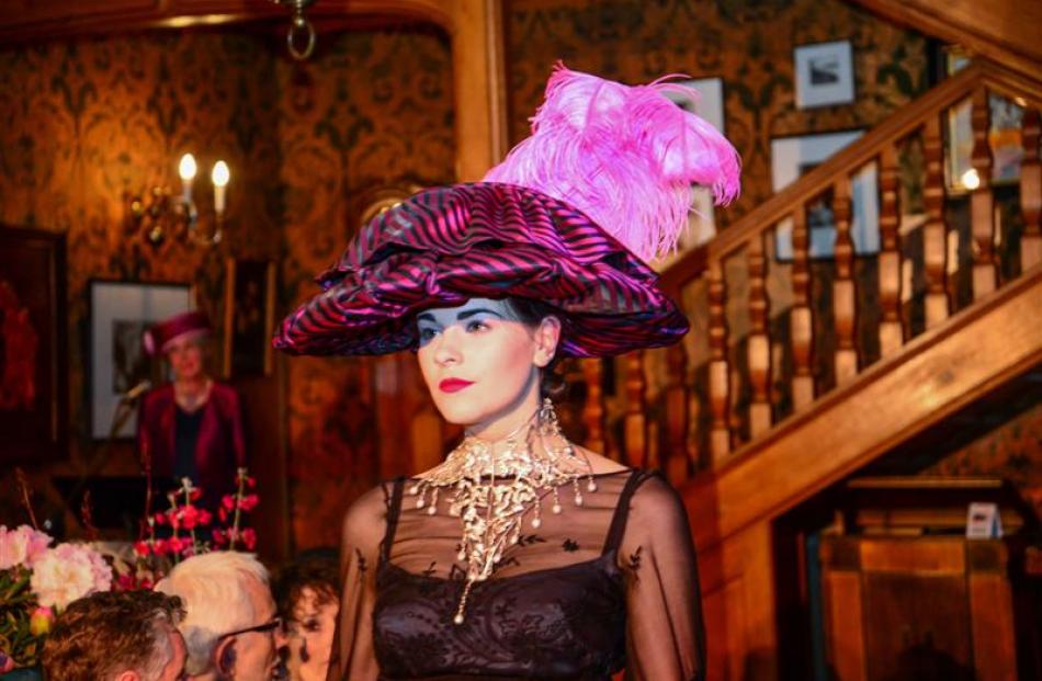Models parade a century of hat fashion at the ''Hats on Royal'' fashion show held at  Olveston on...