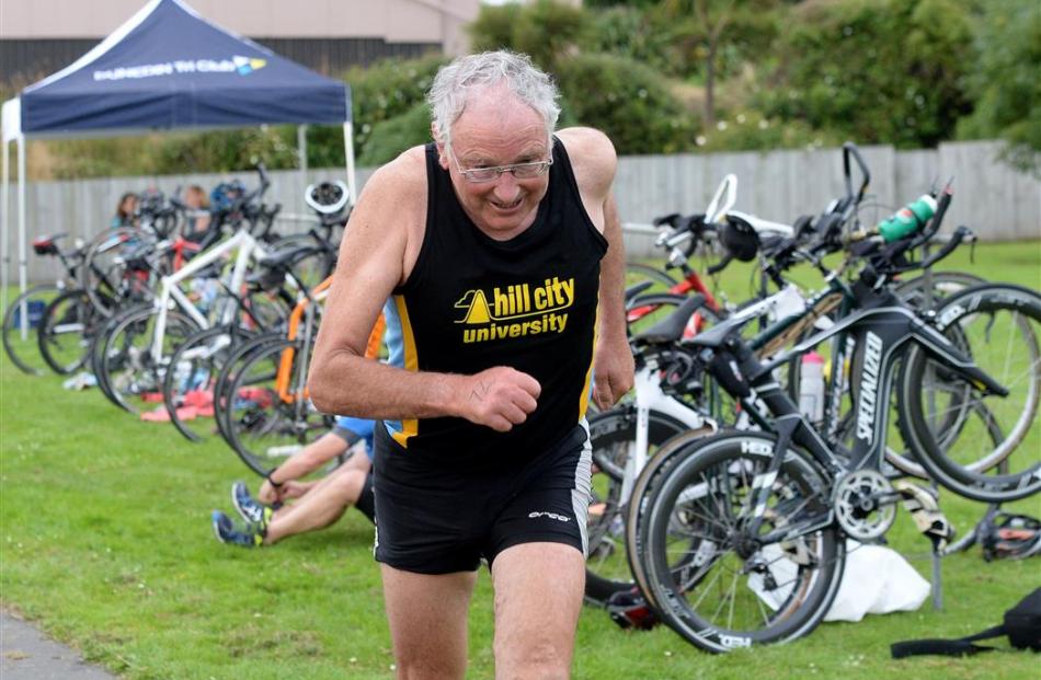 Morris Hall competes in the Masters Games triathlon at Macandrew Bay yesterday. Photo by Linda...