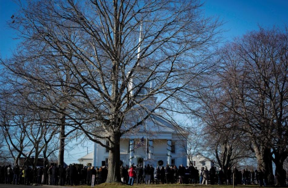 Mourners attend the funeral service of teacher Victoria Soto, a victim of the Sandy Hook...