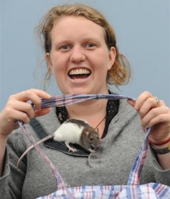 Mr Nibbles and Rowan McArthur, after she found the rat in the pocket of a donated coat  inside...