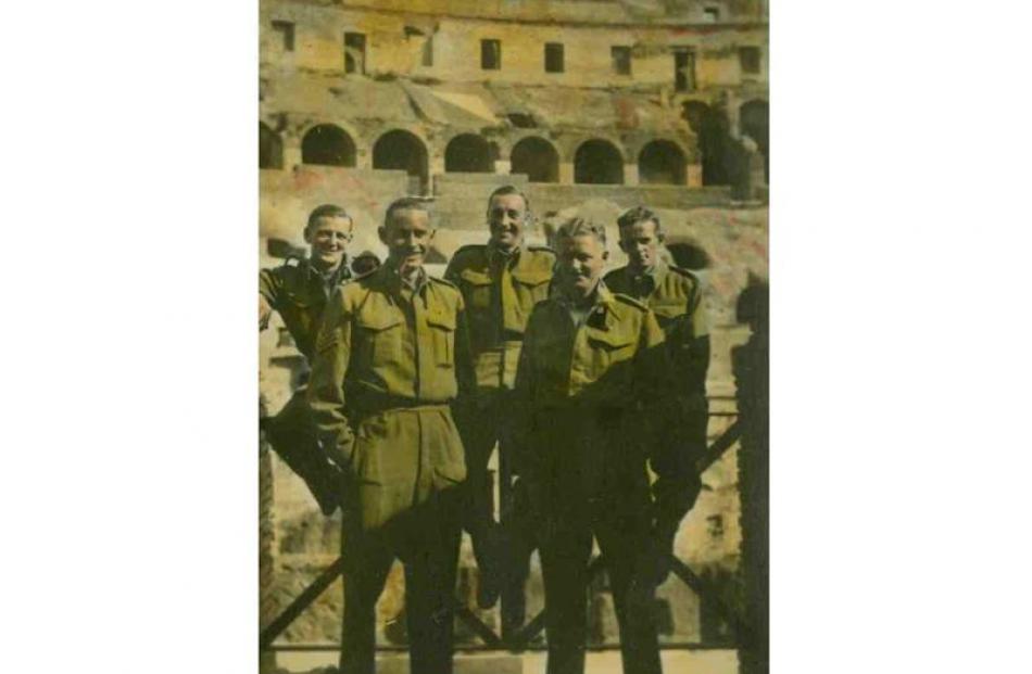 Murray Newman (at front left) on leave in Italy, at the Colosseum, in Rome.