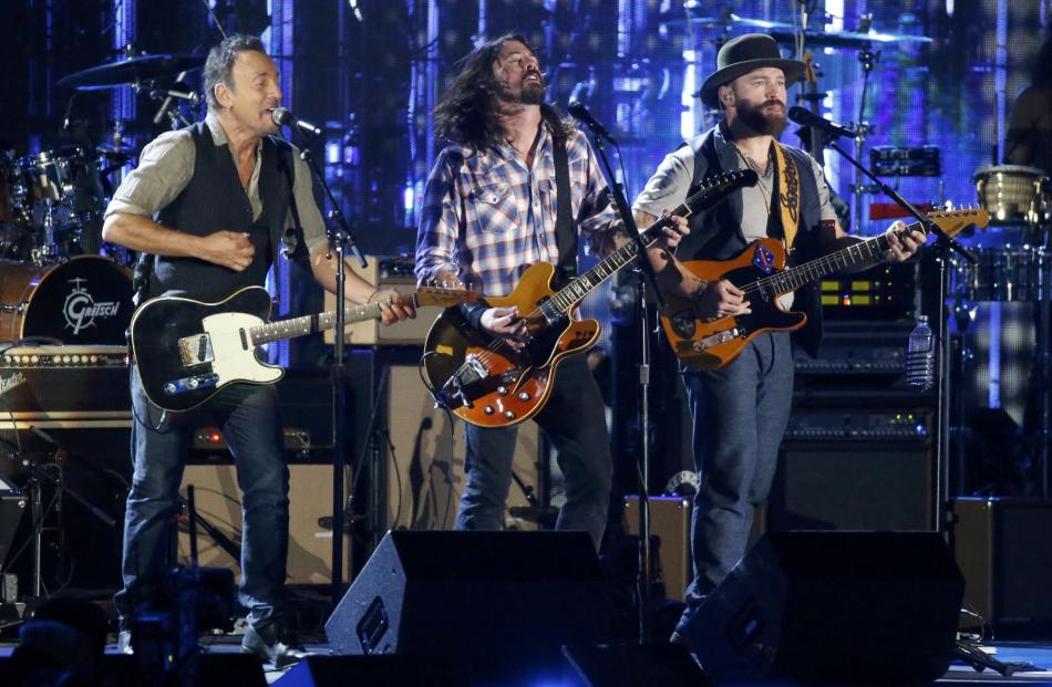 Musicians Springsteen, Grohl and Brown perform during The Concert for Valor on the National Mall...