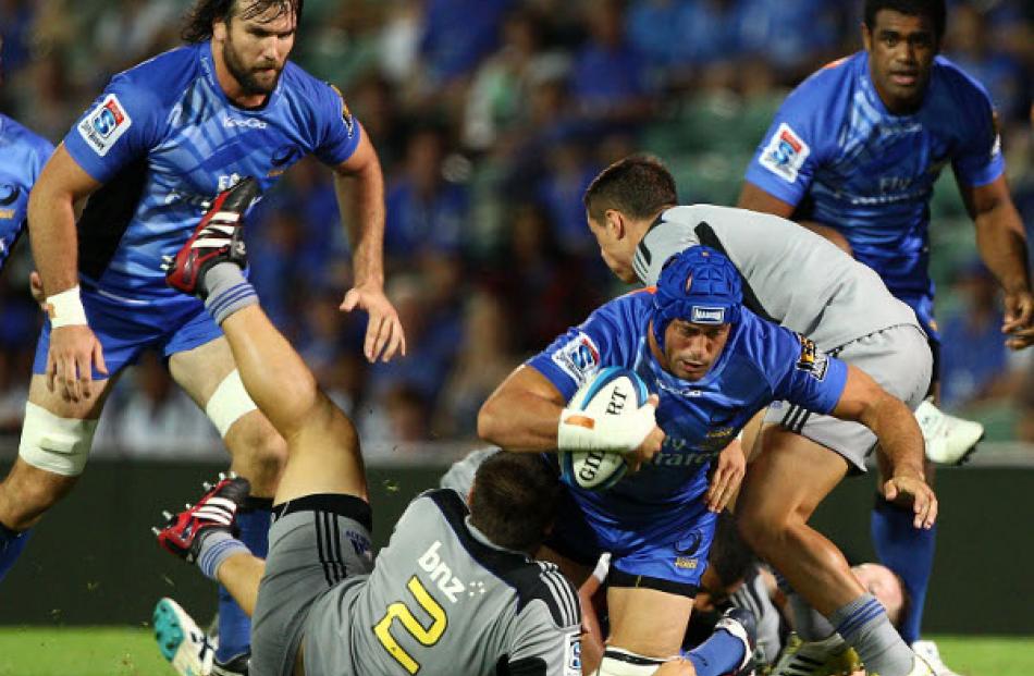 Nathan Sharpe of the Force pushes forward during the round three Super Rugby match between the...