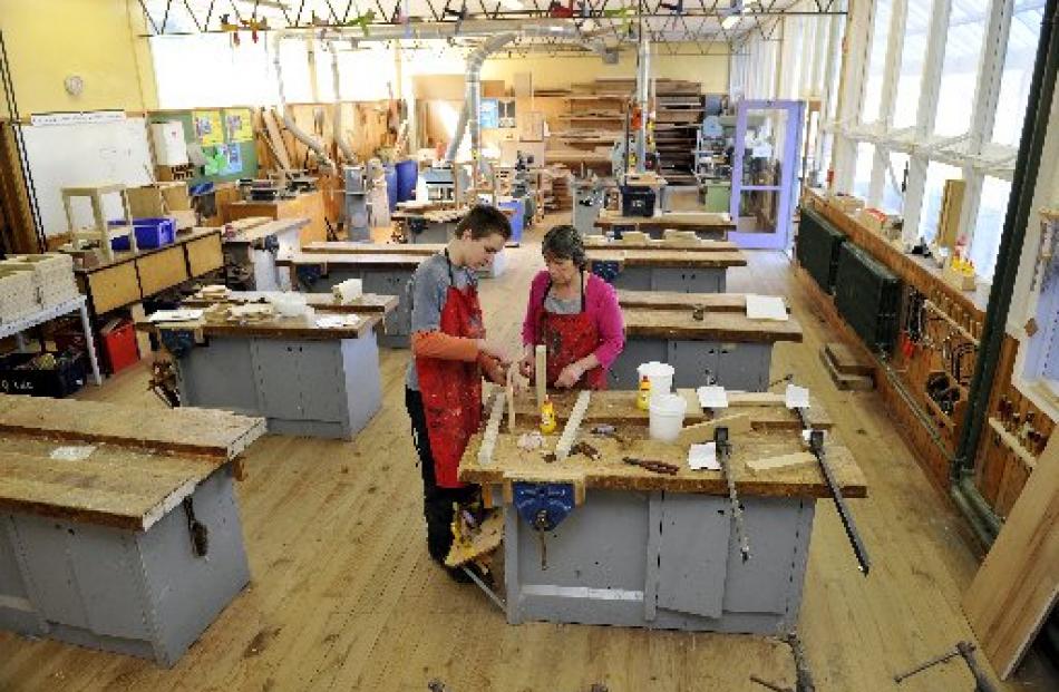 Nathaniel McMonagle (13) and teacher aide Linda Bates have the Kaikorai Valley College woodwork...