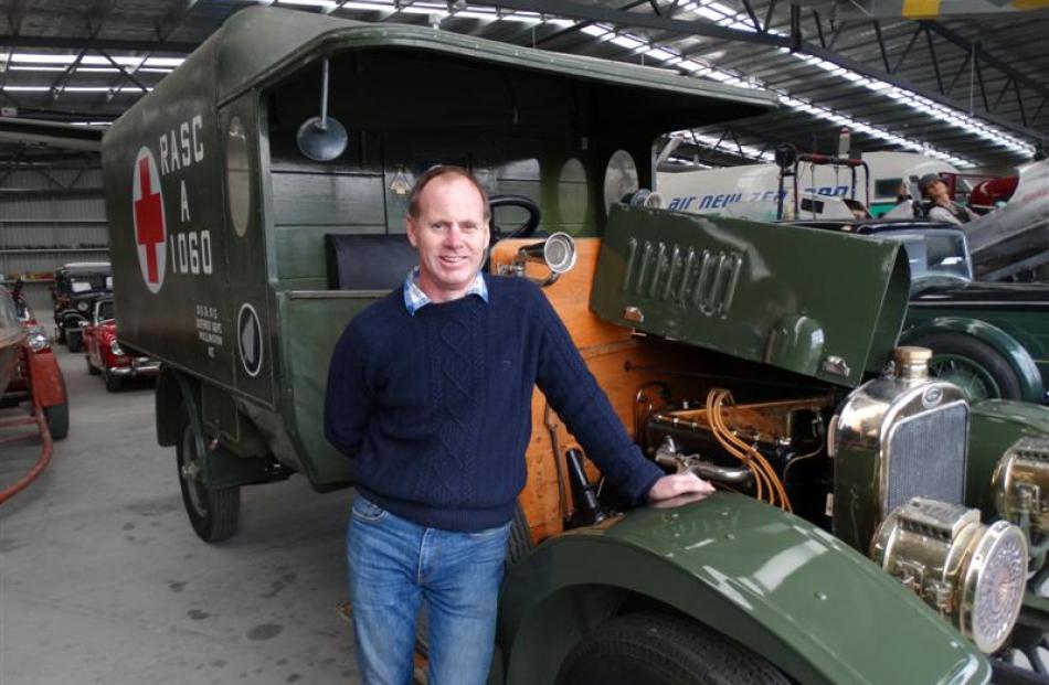 National Transport and Toy Museum curator Jason Rhodes with the 1915 Rover Sunbeam World War 1...