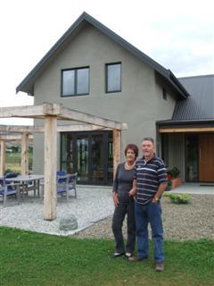 Neil and Joyce Jubb, of Bannockburn, in front of their eco-house. Photos by Lynda Van Kempen.