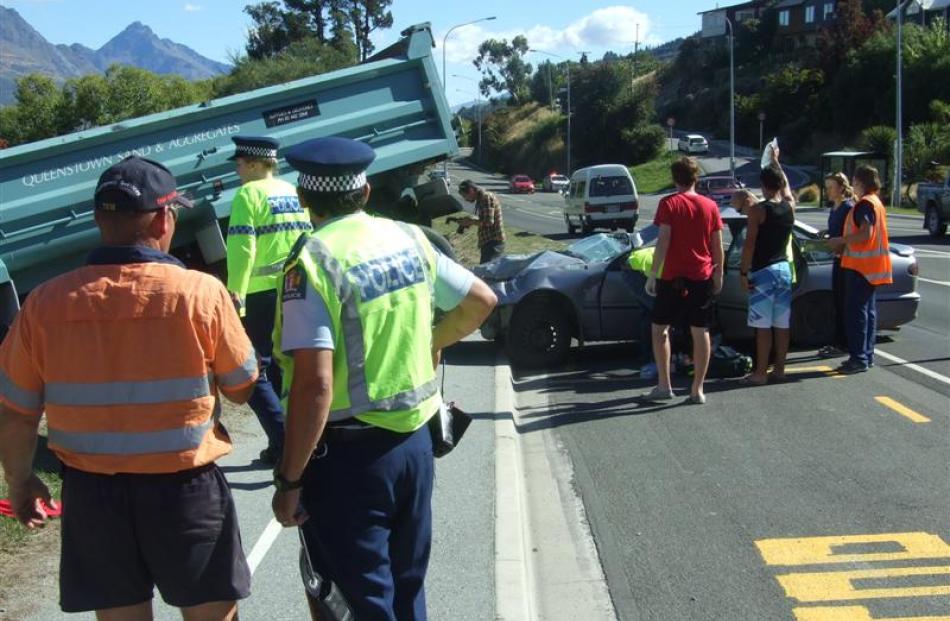 New rural medical students (wearing red) deal  with "seriously injured" patients in a crash...